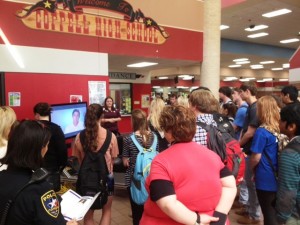 Coppell High School students watch Carson's presentation